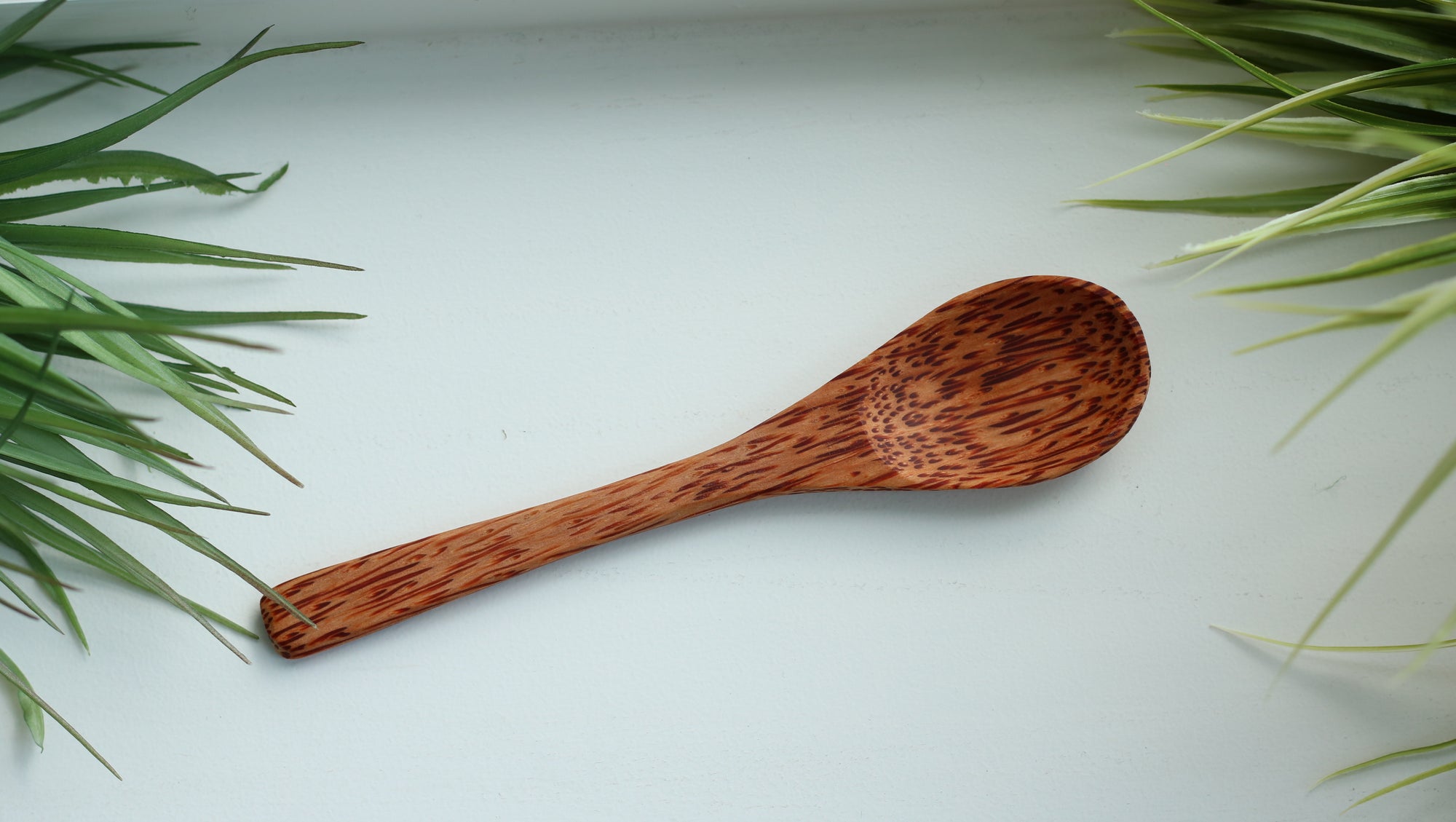 Wooden Coconut Spoons that are designed and handcrafted from palm trees
